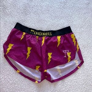 Vibrant Purple and Yellow Athletic Shorts with Lightning Pattern